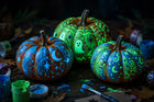 Glow-in-the-dark painted pumpkins Halloween craft